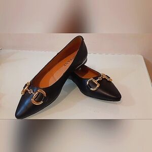 Brand new black leather shoes with gold buckle size 5.5